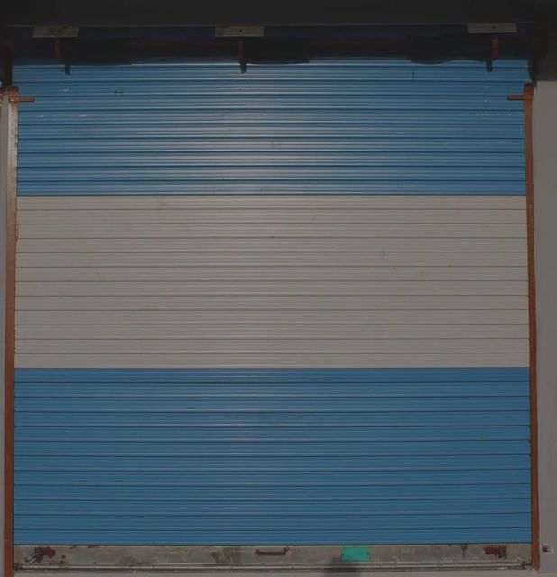 Painted Rolling Shutter Size 8x10 Feet Shutter Type SS/MS Colour Blue & White Surface Treatment Painted Brand F Z Steel - Image 2