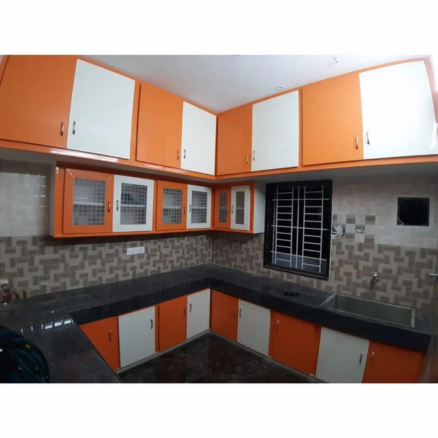 U Shape PVC Modular Kitchen Material PVC Appearance Modern Finish Type Polished Color Orange And White Kitchen Design - Image 1