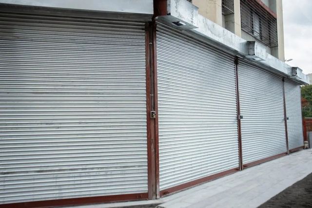 Motorised Rolling Shutter Material Mild Steel Wall Thickness 6 mm Length Approx. 14 Feet Usage/Application Shop Height Approx. 12 - Image 1