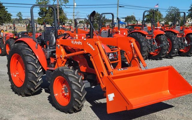 Kubota M7060 Utility Tractor for Field and Farm Operations - Image 1