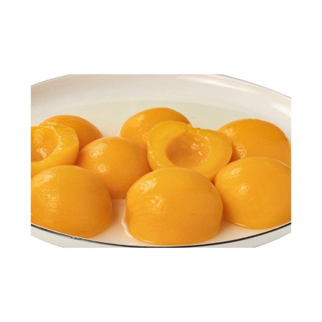 Premium canned yellow peach halves available in bulk ideal for food suppliers and distributors - Image 3