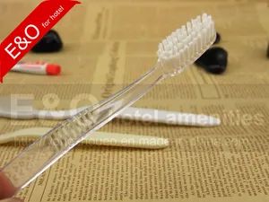 Disposable Transparent Hotel Toothbrush with Toothpaste Size 17.5cm Trademark e&o Handle PP, PS Type Toothbrush Material - Image 1