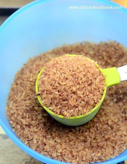 Red Rice Grains in Green Measuring Cup Bulk Grain Container From Orissa for Cooking and Baking - Image 3