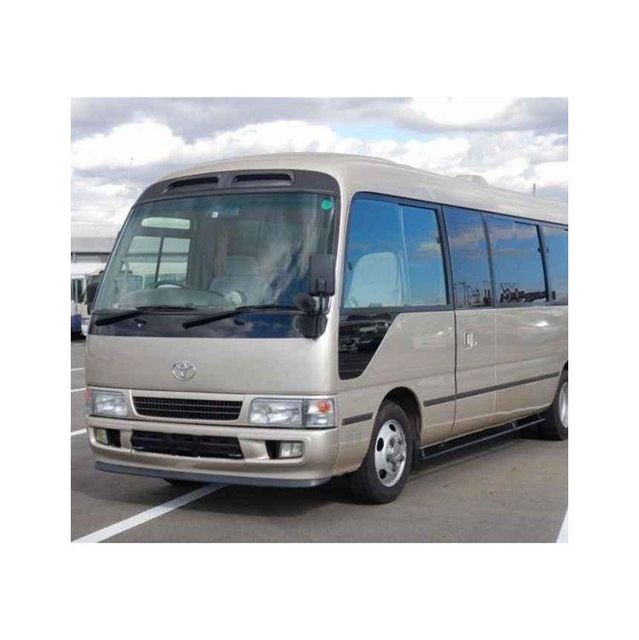Toyota Coaster vehicle for public transport and private hire services Toyota Coaster high roof bus for maximum passenger capacity Toyota Coaster minibus with manual and automatic transmission options Toyota Coaster reliable bus with low maintenance cost and durability - Image 1