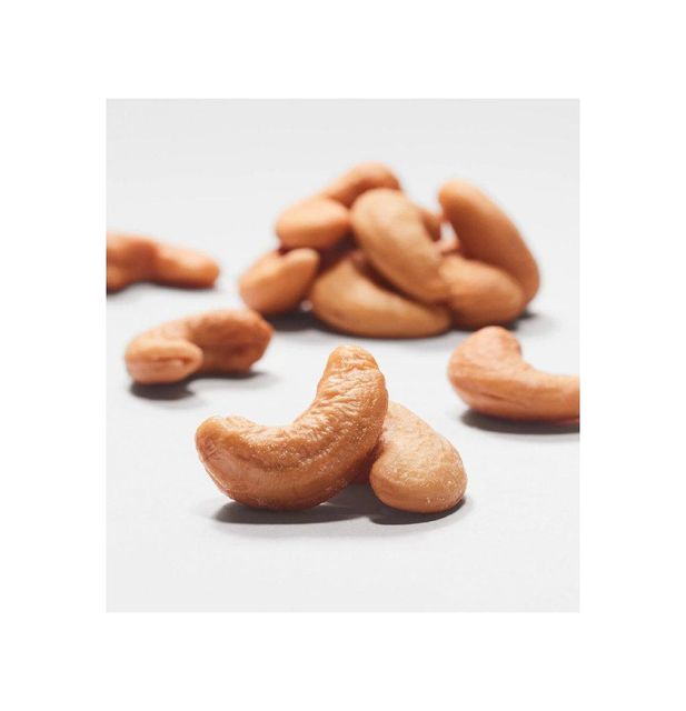 Salted roasted cashew nuts available in bulk for snack and food industries - Image 1