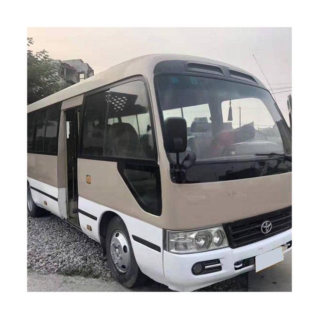 Toyota Coaster vehicle for public transport and private hire services Toyota Coaster high roof bus for maximum passenger capacity Toyota Coaster minibus with manual and automatic transmission options Toyota Coaster reliable bus with low maintenance cost and durability - Image 5