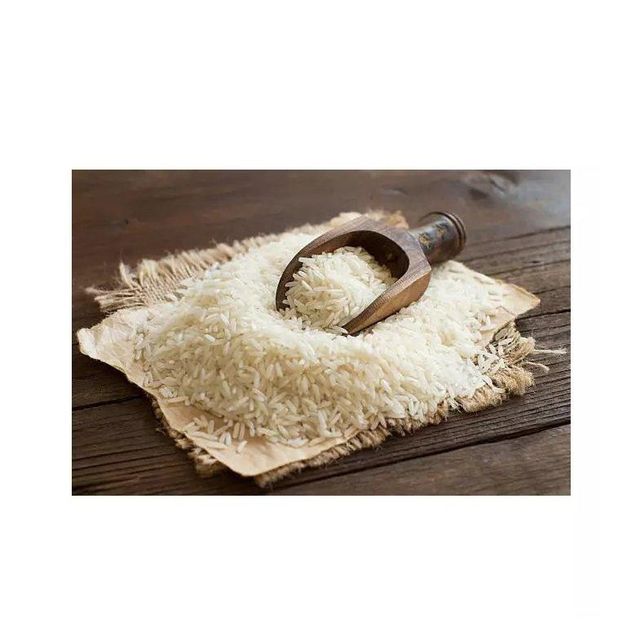 Long grain white rice for fluffy cooking and delicious meals Pure white rice processed under hygienic conditions for safe consumption Export quality white rice for international food markets and distribution White rice for restaurants hotels and large scale catering services - Image 4