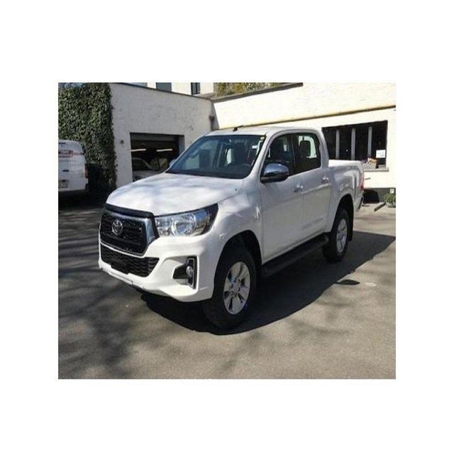 Toyota Hilux double cabin truck for commercial and personal use Toyota Hilux 4x4 pickup for rough terrain and off road adventures Toyota Hilux durable pickup with strong chassis and high load capacity Toyota Hilux pickup truck with advanced safety and modern features - Image 3