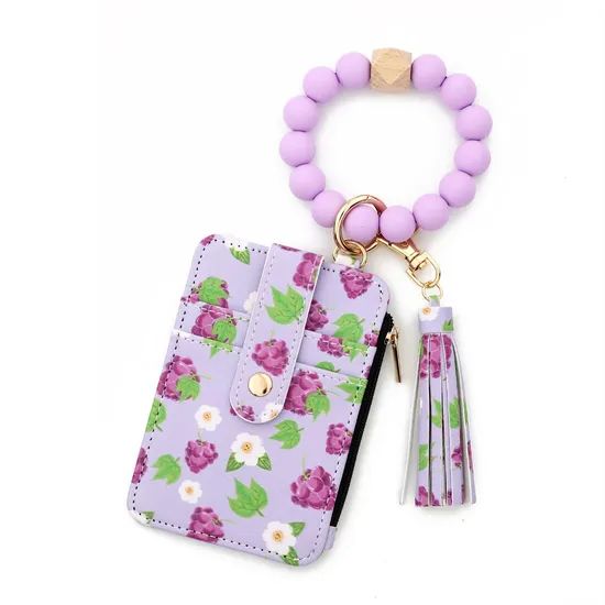 Stylish Leather Tassel Flower Keychain and Silicone Bead Bracelet - Image 3