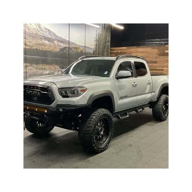 Toyota Tacoma modern pickup with comfortable interior and smart technology Toyota Tacoma all terrain vehicle for desert mountain and rough roads Toyota Tacoma pickup truck with automatic and manual transmission options Toyota Tacoma durable truck for construction agriculture and logistics use - Image 1