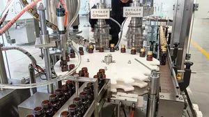 Automatic Rotation Pharmaceutical 5ml 10ml Small Bottle Oral Liquid Filling Capping and Labeling Machine - Image 5