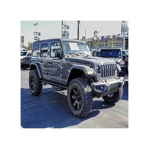 Jeep Wrangler adventure SUV with rugged design strong chassis high ground clearance powerful engine removable top and doors ideal for off road driving trail riding and exploring extreme environments with comfort - Image 3