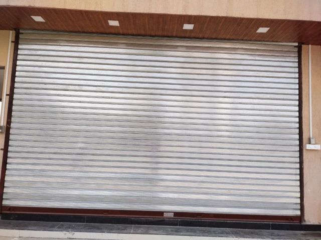 Stainless Steel Commercial Rolling Shutters Shutter Type Aluminium Material Stainless Steel Movement Direction Up Or - Image 1