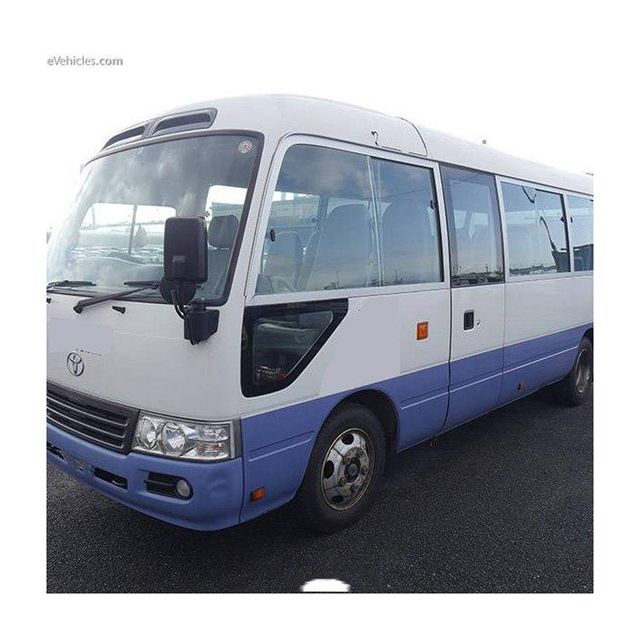 Toyota Coaster bus with comfortable seating and air conditioning system Toyota Coaster commercial bus for tourism and travel companies Toyota Coaster passenger bus with spacious interior and smooth ride Toyota Coaster minibus for long distance travel and group transportation - Image 3