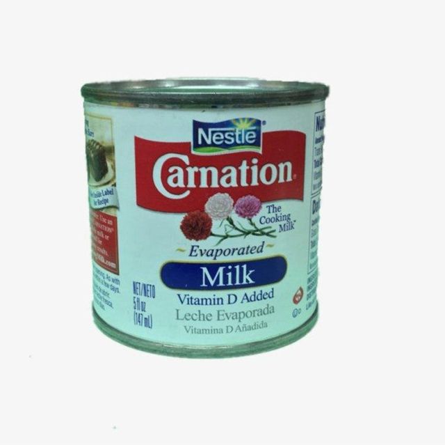 Premium Carnation milk available with long shelf life and factory sealed cans - Image 1