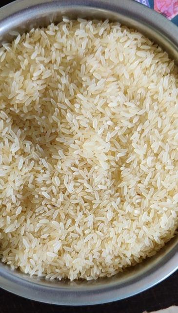 White Rice Grains in Wooden Spoon for Cooking and Baking - Image 4