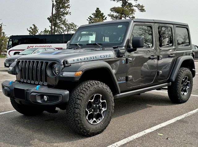 Jeep Wrangler rugged off road vehicle with strong 4WD system powerful engine high suspension travel durable build removable doors and roof perfect SUV for adventure lovers trail driving and extreme terrain exploration - Image 1