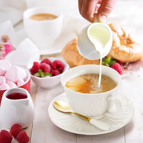 Exquisite Large Spoon New Design White Porcelain Tea Cups and Saucers - Image 6