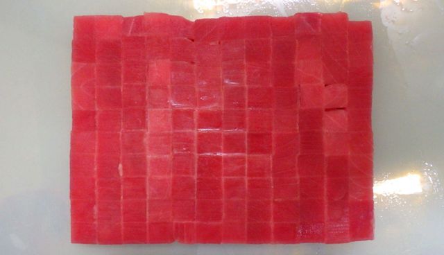 Frozen Yellowfin Tuna Cube Form Cube Net Weight 100% Size 1.5x1.5x1.5cm Carton Weight 10lbs Texture Skinless, Boneless Packing Unit 1lb/vacuum - Image 1
