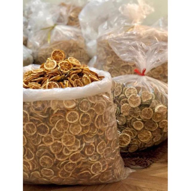 DRIED LEMON SLICE GRADE A Grade A Type Dried Form Slices Color Various Texture Dried Weight (kg) 1 kg Flavor Refreshing Place of Origin Indonesia - Image 1
