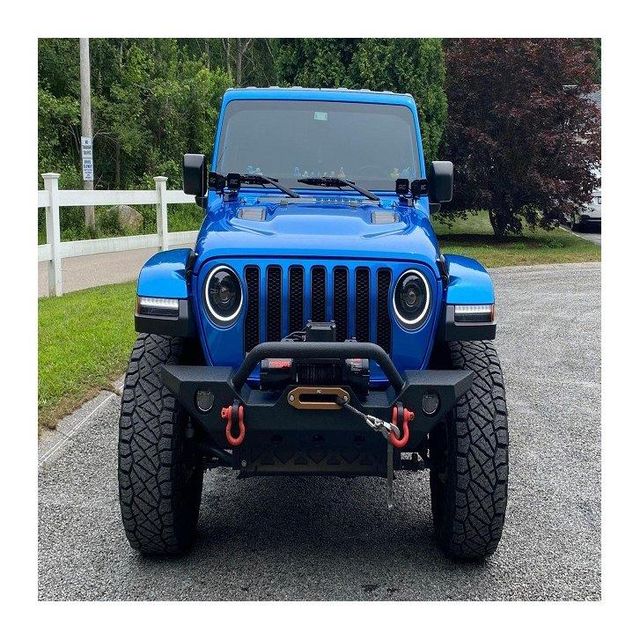Jeep Wrangler high performance off road SUV with advanced 4x4 capability durable construction powerful engine off road tires and modern safety features designed for rough terrain mountain desert and outdoor adventures - Image 4