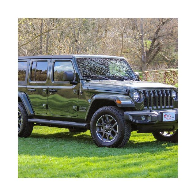 Jeep Wrangler iconic off road vehicle with powerful engine high ground clearance advanced traction system rugged design removable doors and roof ideal for desert driving mountain trails and adventure journeys - Image 4