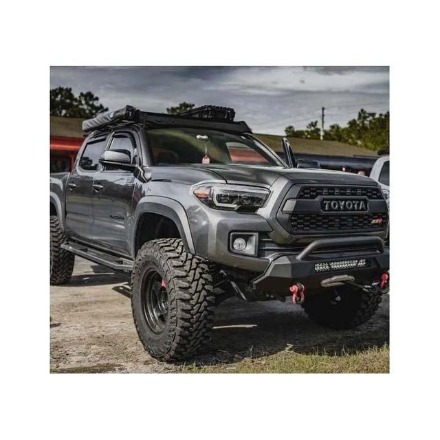 Toyota Tacoma modern pickup with comfortable interior and smart technology Toyota Tacoma all terrain vehicle for desert mountain and rough roads Toyota Tacoma pickup truck with automatic and manual transmission options Toyota Tacoma durable truck for construction agriculture and logistics use - Image 3